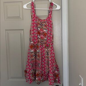 Vibrant Pink and Orange Dress with Floral Patterns